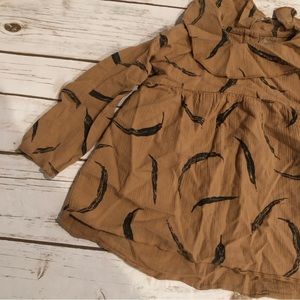 Play up feather blouse